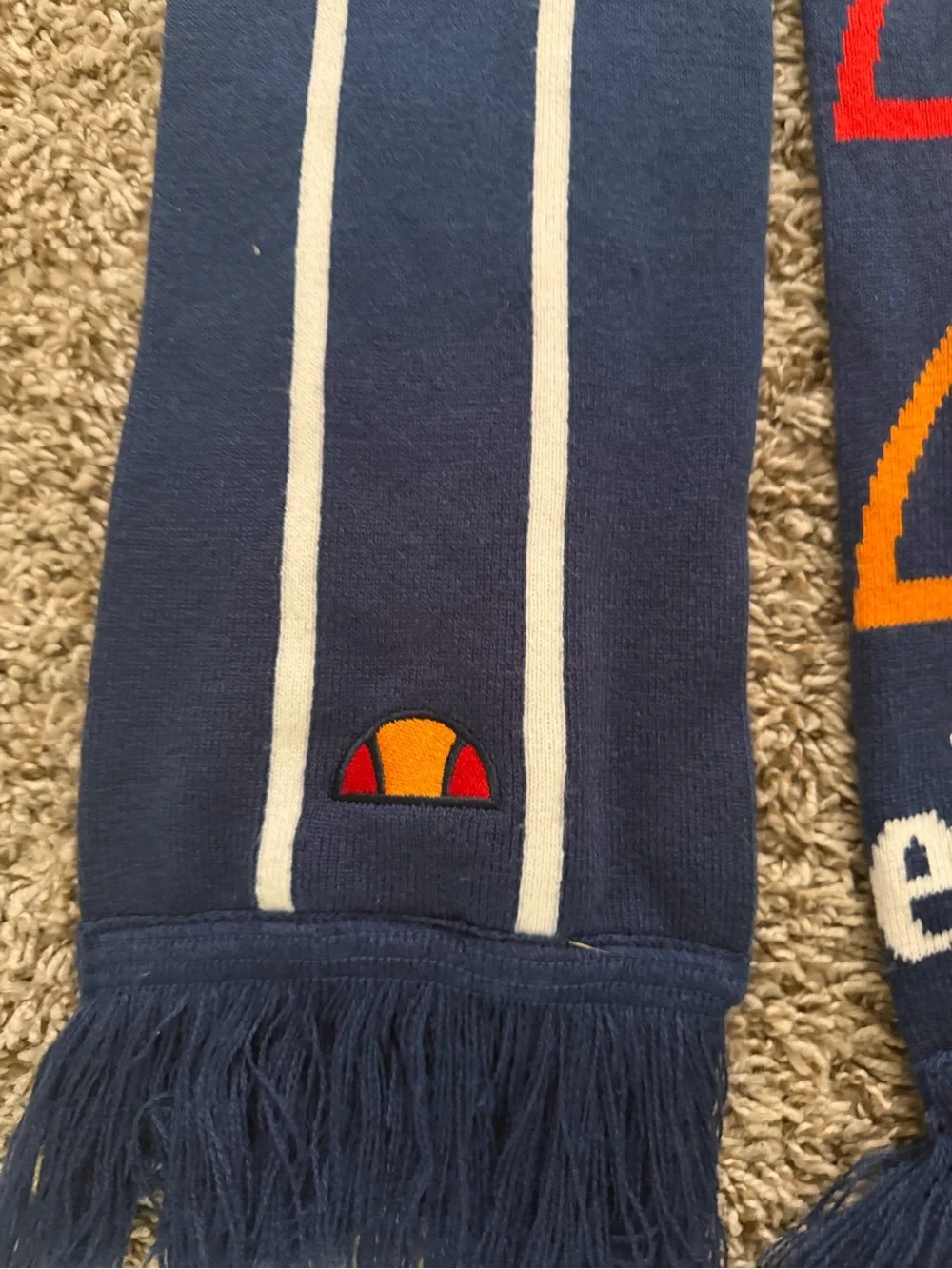 Ellesse Navy Scarf with White, Red and Orange Logo Arcs